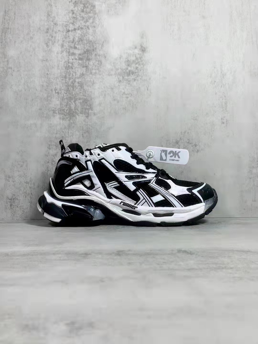 Balenciaga Runner Sneaker Black White 677403 W3RB2 9010 - Stylish and Versatile Footwear Balenciaga Runner Sneaker Black White 677403 W3RB2 9010 - Stylish and Versatile Footwear